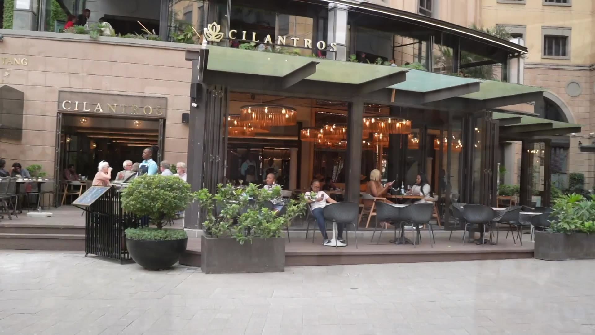 Cilantros at Nelson Mandela Square — terrace seating on the piazza