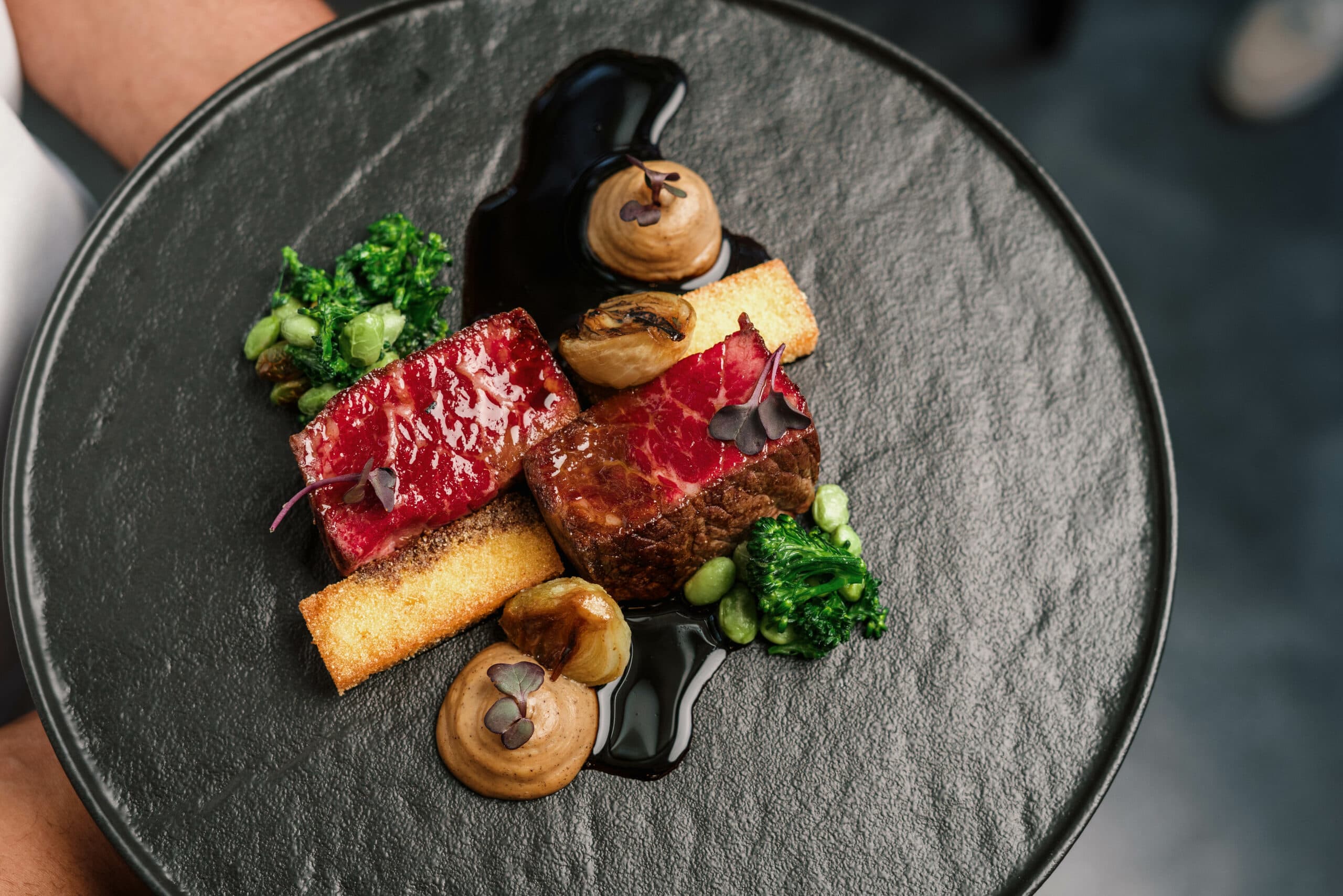 Beautifully plated main course at Qunu